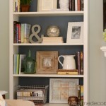 Styling Bookcases For a Much Used Family Room: Mixing Pretty and Necessity