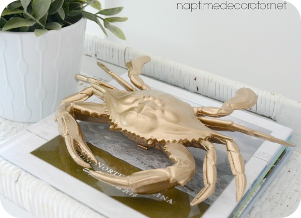 gold spray painted crab